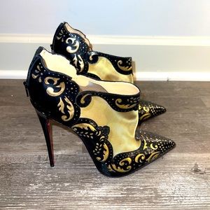 Brand new Gold and black red bottoms